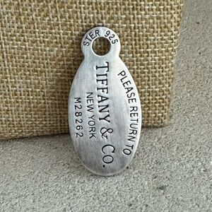 Tiffany & Co Return to Tiffany Oval Tag Charm Pendant Silver 925 Numbered